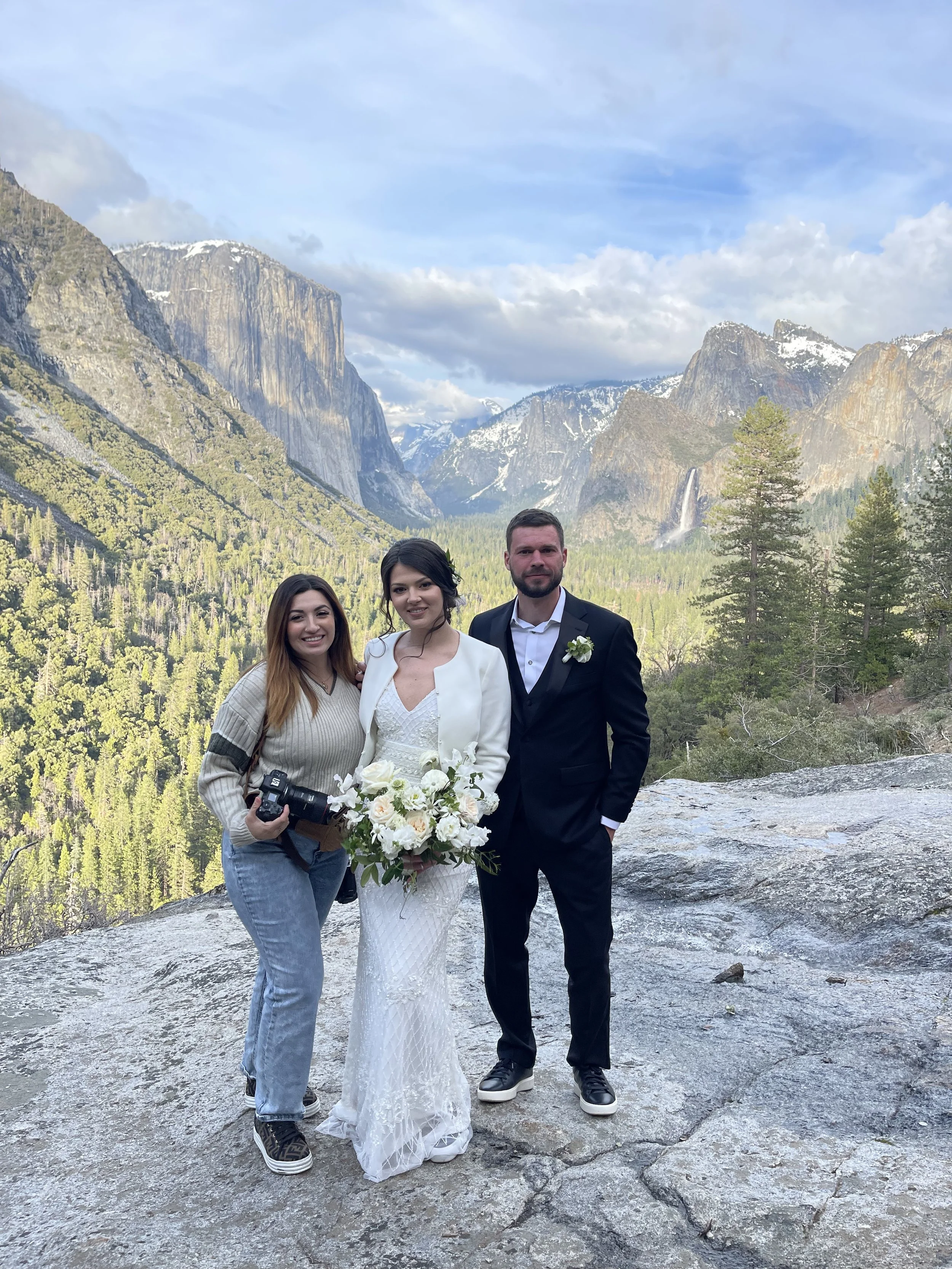 Priscilla Banuelos with bride and groom at Tunnel View; a Yosemite wedding photographer photo.