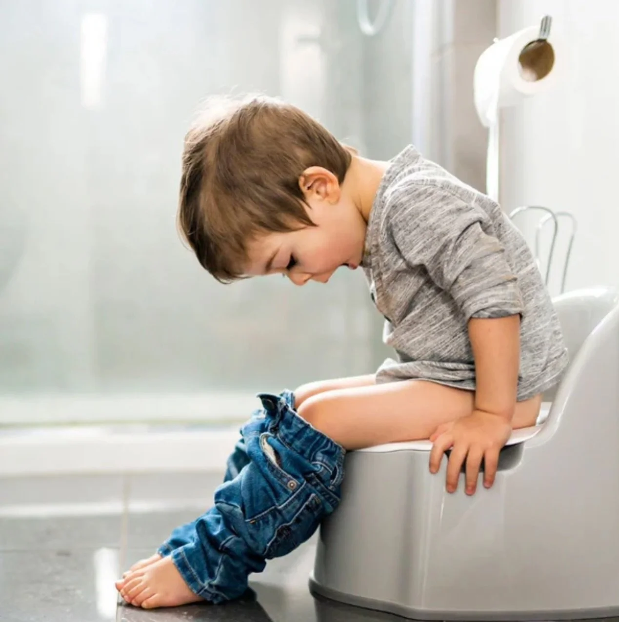 Toddler learning to use the potty