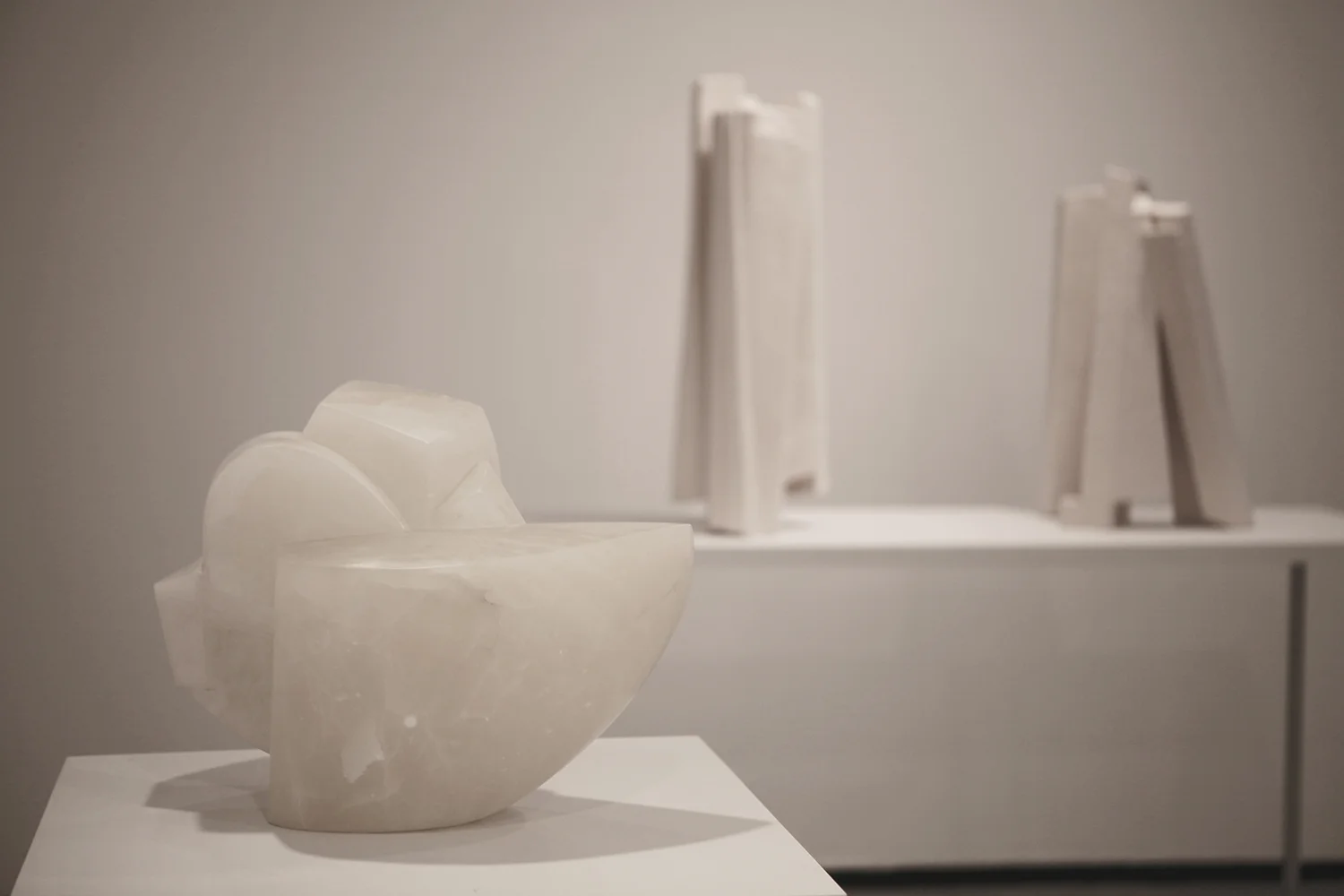   KM 245 P.H ., 2007, 17x20x11 in. alabaster.&nbsp; Untitled I, II, (Mountain Shadows)  2013 acqua resine. 