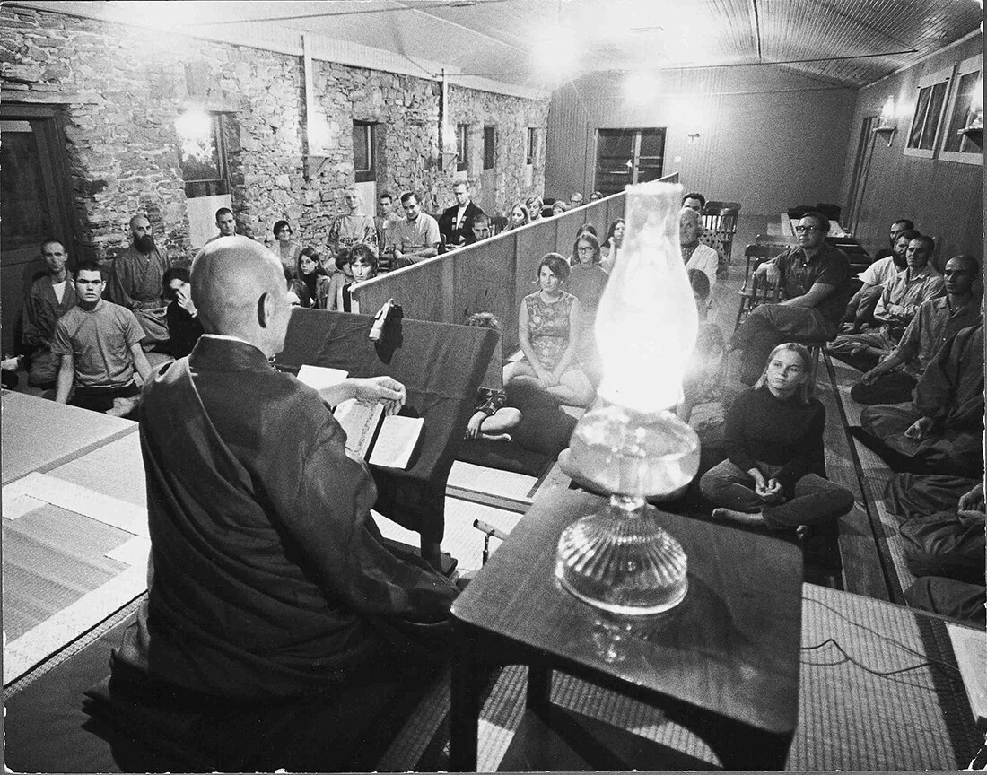 Tassajara’s founder Suzuki Roshi lecturing in the original Zendo (c. 1968)