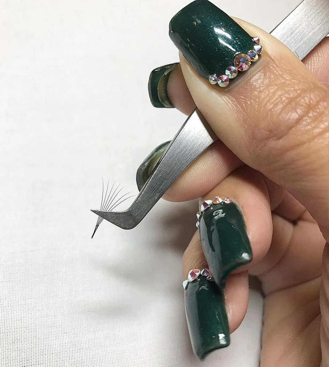 Proper fan making techniques being taught.