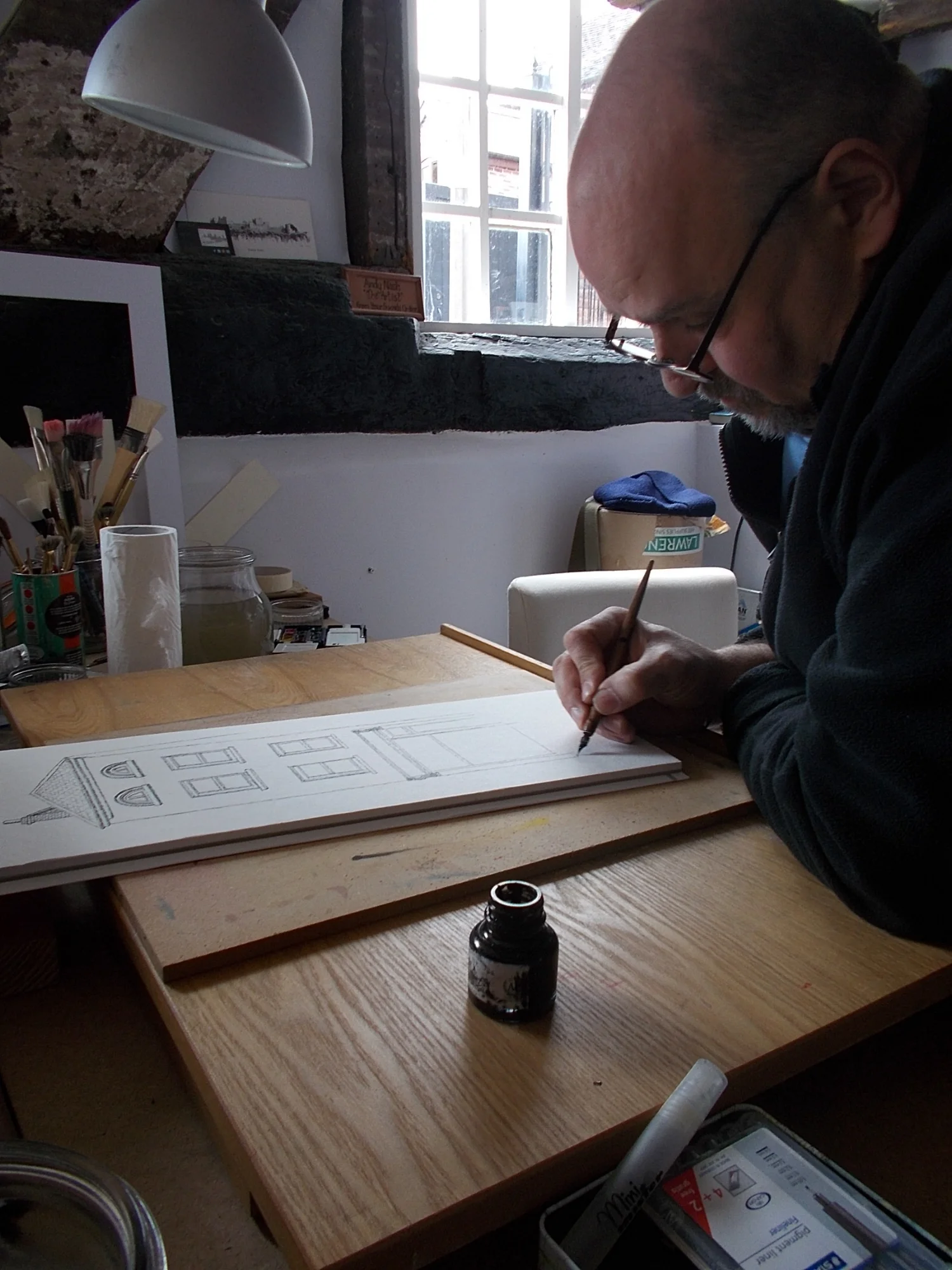 The artist at work.&nbsp;