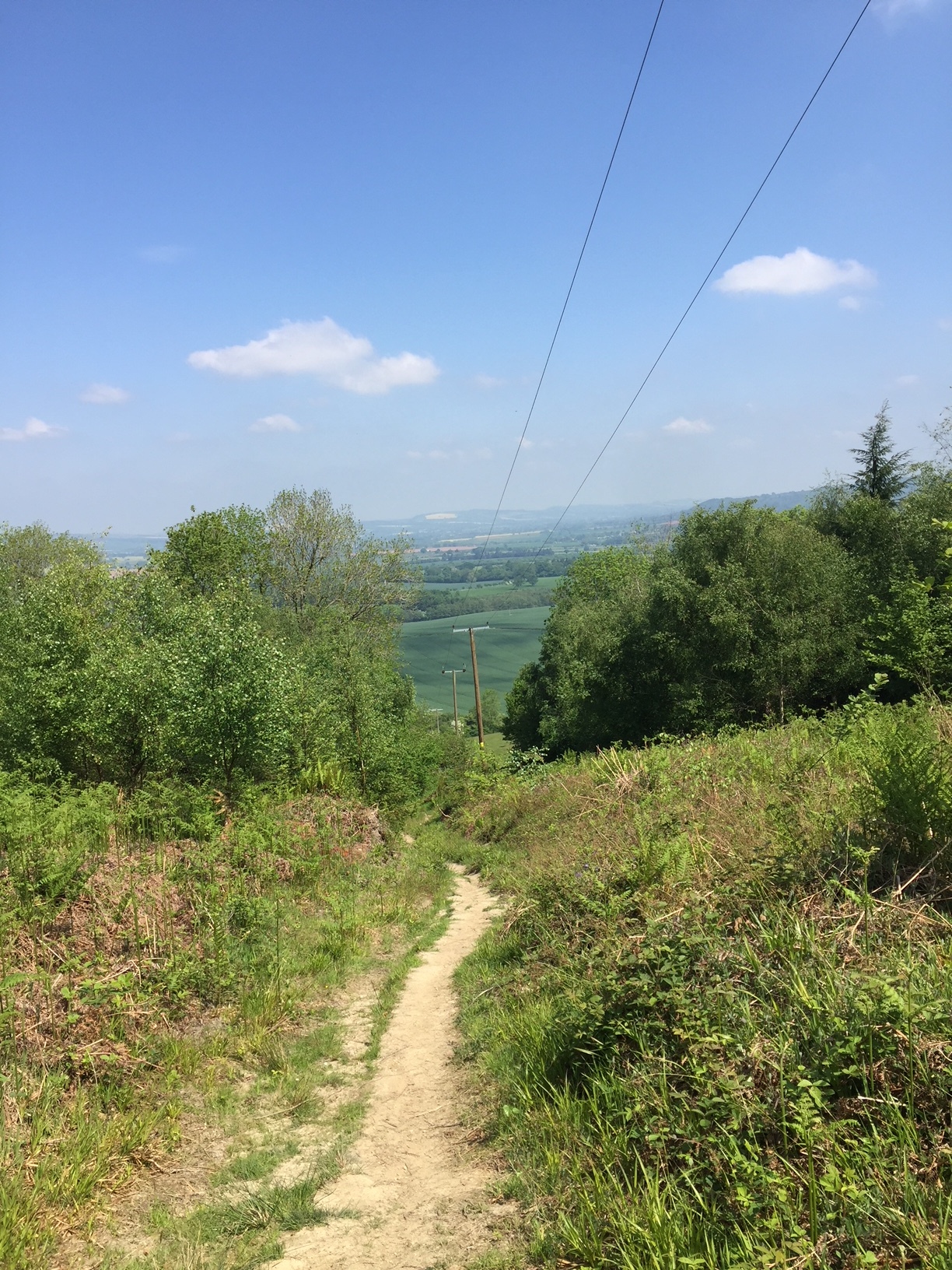 Second descent begins here views out to Craven Arms and Ludlow Source: Letsgoludlow.com