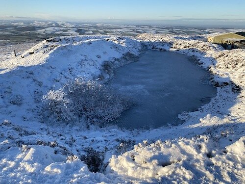 Frozen treat: Lake at the top of Abdon Burf