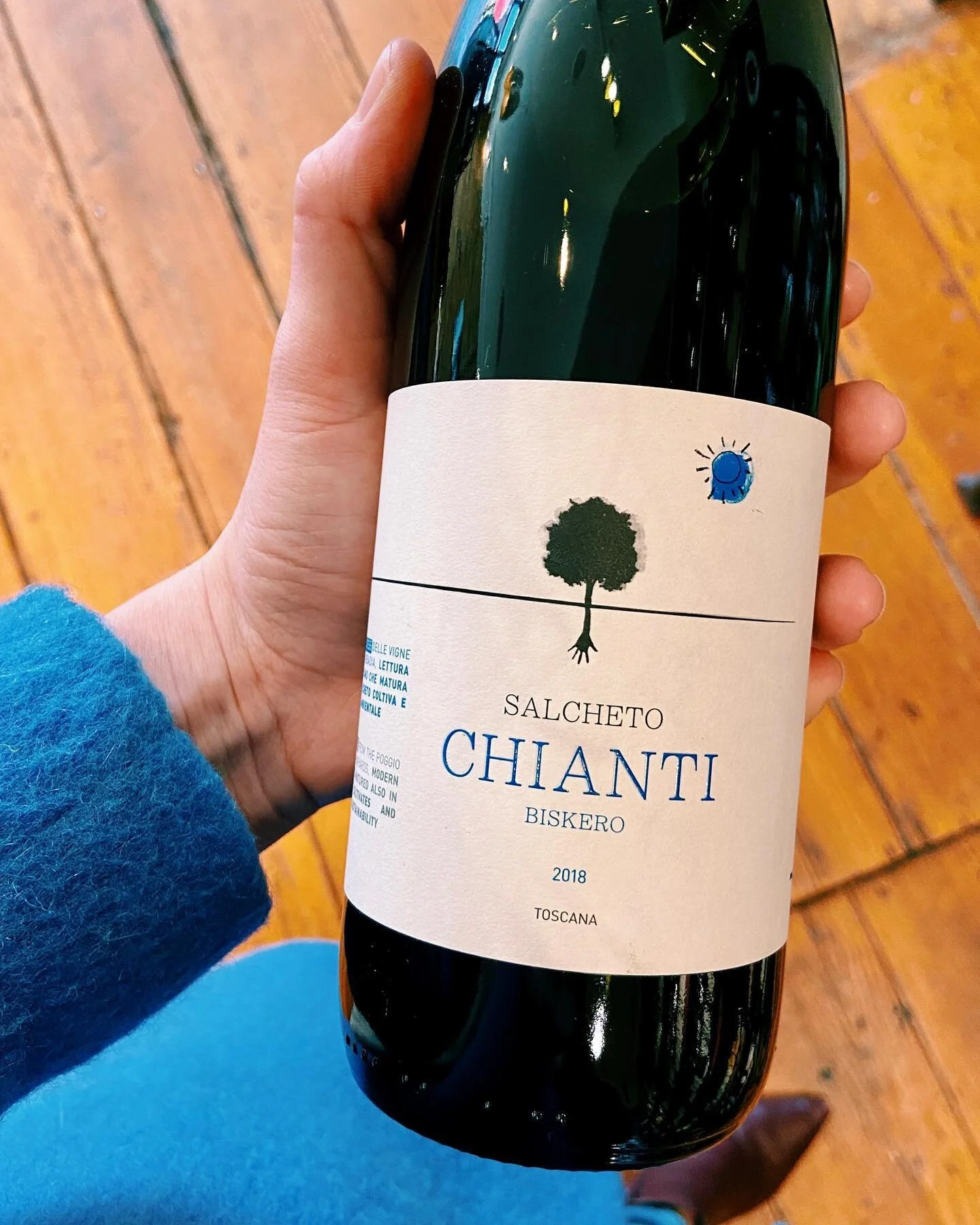 what a win for america! couldn&rsquo;t be happier to find this #chianti from one of the #vineyards we stayed at during a summer tour of tuscany right here in dc AND have it match my coat. it&rsquo;s almost too much. 💙