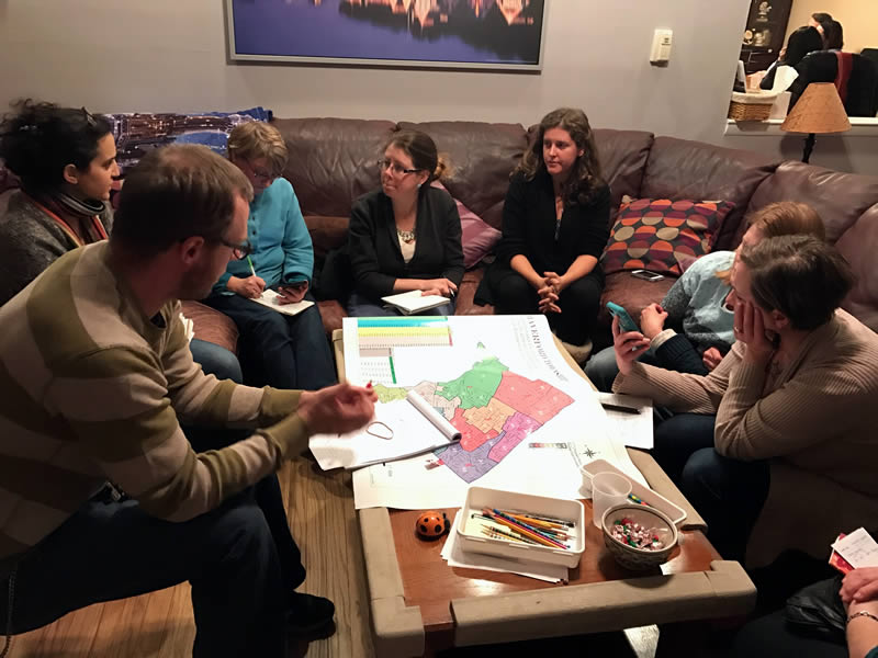 H-CAN members reviewing voting districts.
