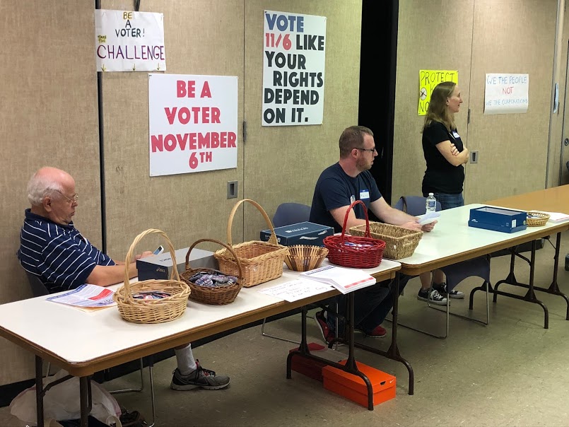  Members of H-CAN’s Indivisible action group at the voter registration tables at the September 16, 2018 H-CAN monthly meeting. 