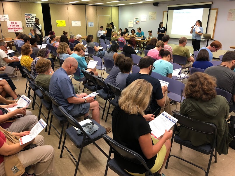  A packed audience taking the “Be a Voter!” challenge at the September 16, 2018 H-CAN monthly meeting. 