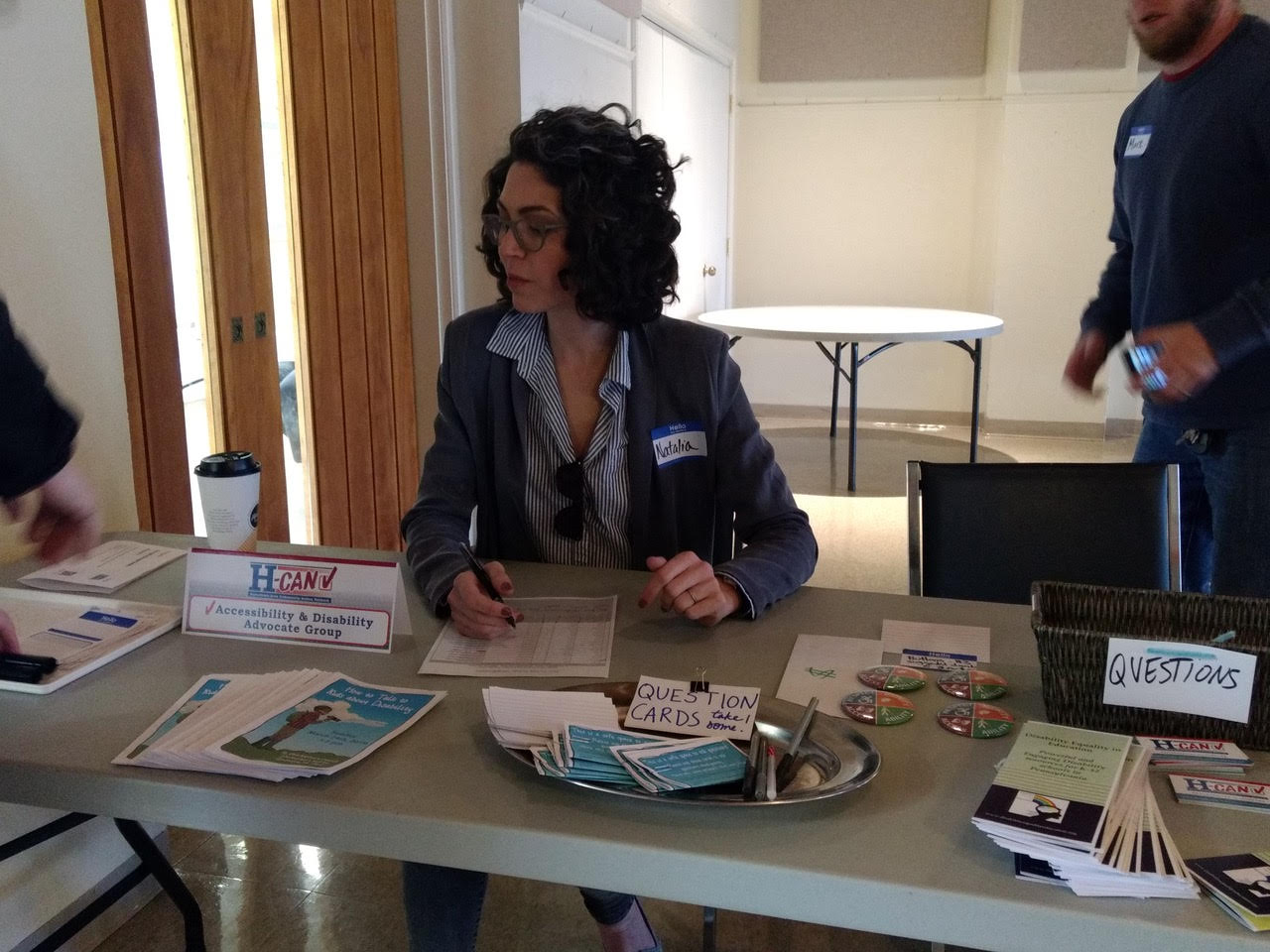 Welcome table at the How to Talk to Kids About Disability event.