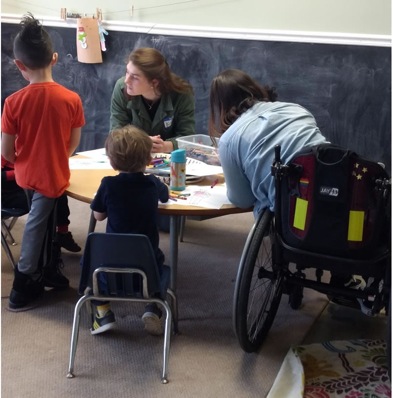  Kids coloring at the How to Talk to Kids About Disability event. 