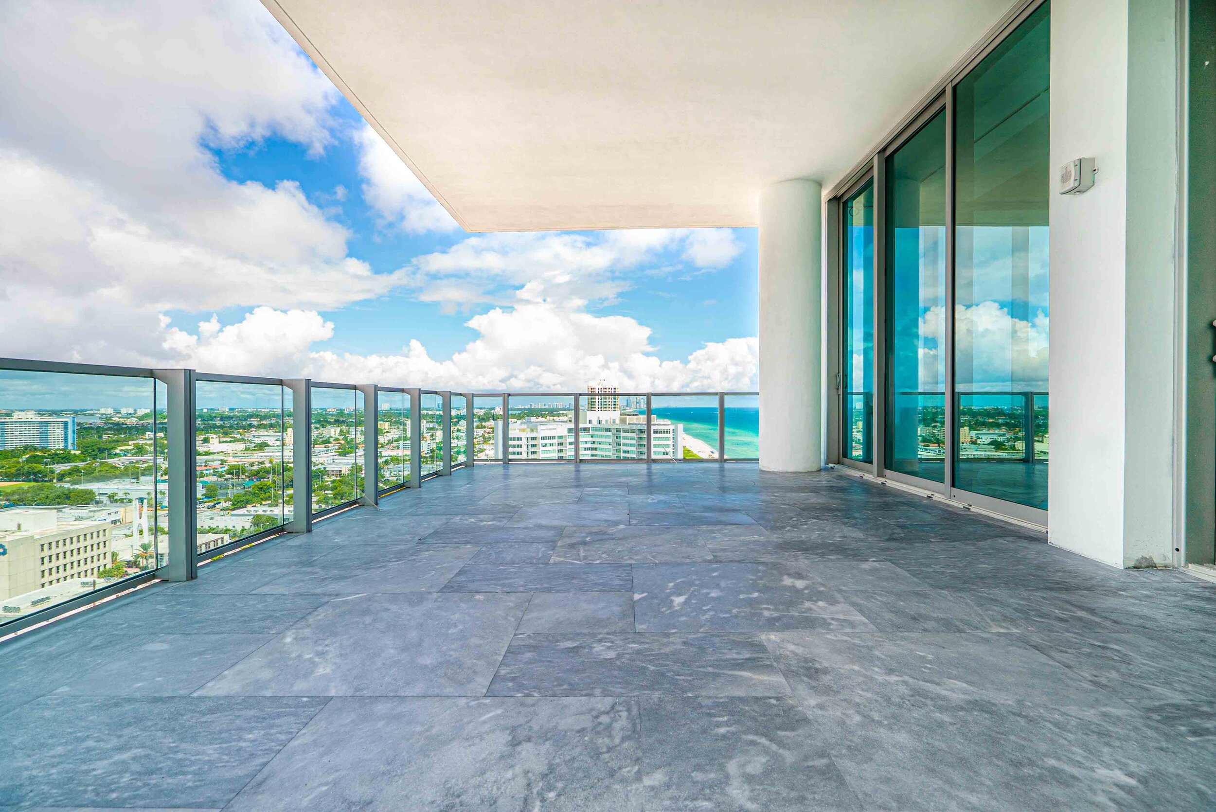 Sunstyle Flooring & Stonework - Elegant Penthouse Condo With High-End Flooring