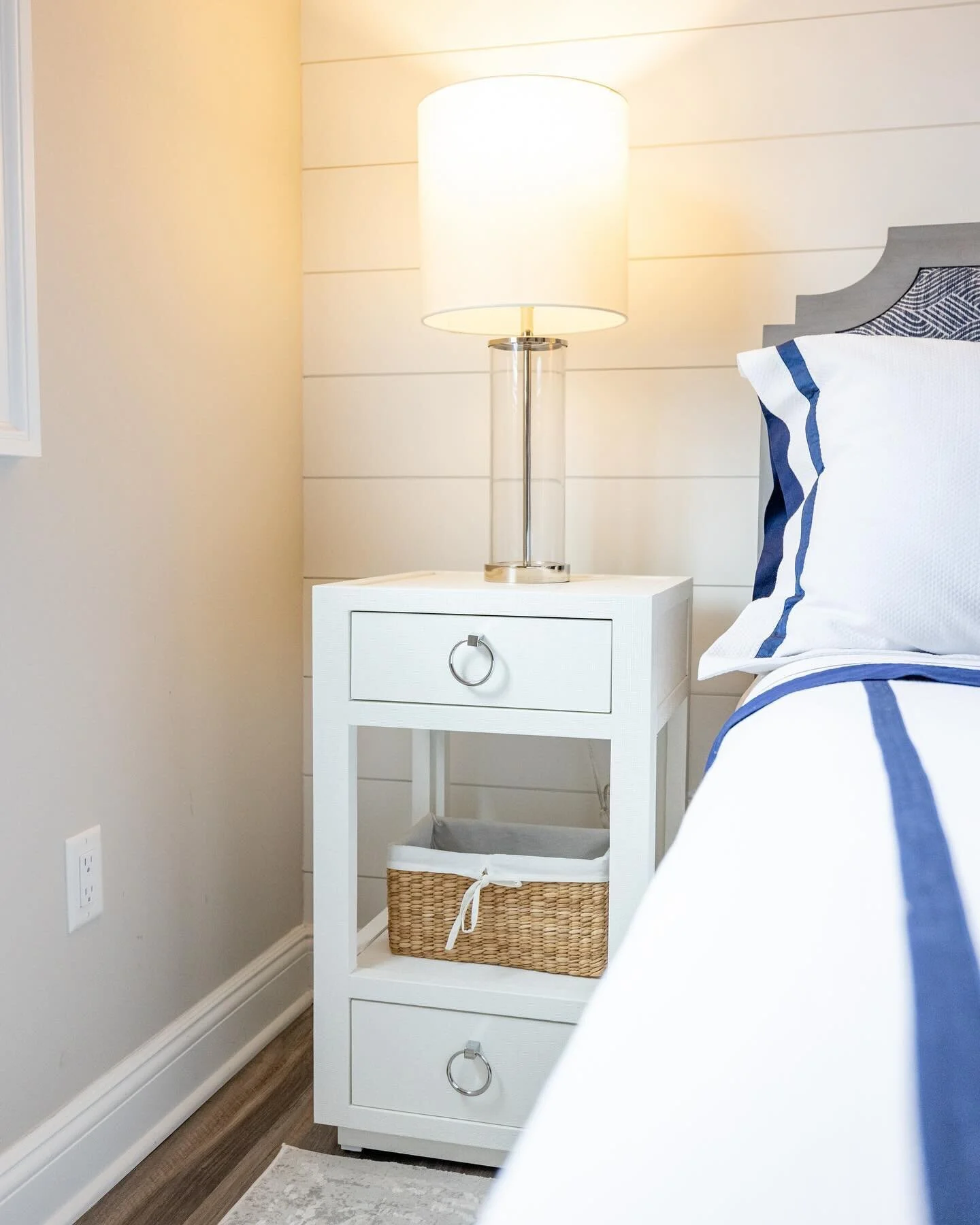 Finding serenity in the simplicity of this white and navy airy bedroom. 

#bedroombliss #nauticlnook #interiordesign #longbeachisland #matouk #redfordhouse #luxurylinens #linens #lbi #shipbottom #natural