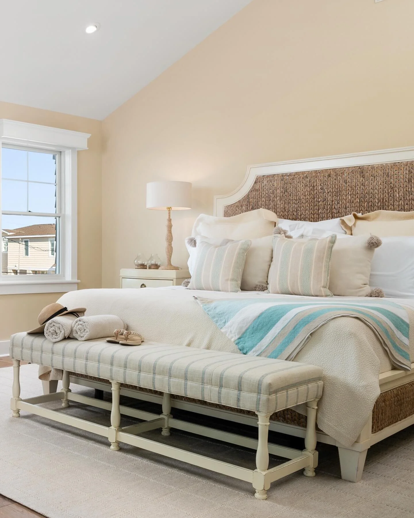 A gentle hint of color within this peaceful and neutral master bedroom. Mixing different materials and shades is always a great way to achieve a successful monochromatic space. 🌾

Photography 📸: @msparkphoto 

#instagood #beachhouse #coastalliving 