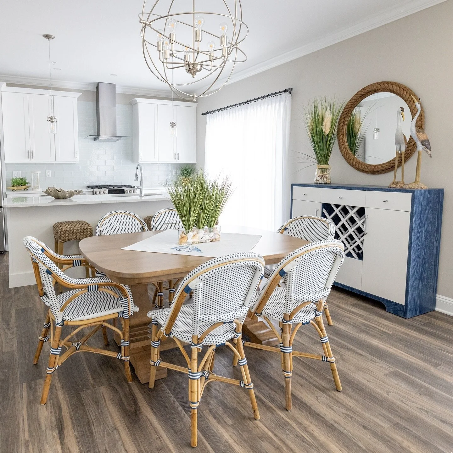 Trying to find the word to describe this driftwood maple dining table. We can&rsquo;t decide if it is square or oval&hellip;. Sqoval? Comment and let us know what you think! 

Also featuring a custom cerused oak wine cabinet finished in true blue wit