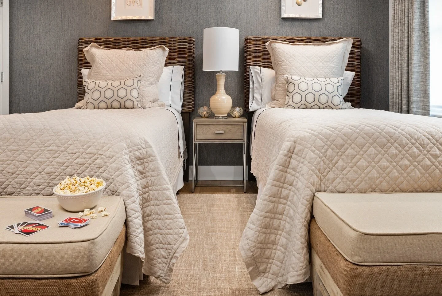 Double the beds, double the style featuring Annie Selke&rsquo;s washed linen quilts. We love neutrals, but we decided to contrast it with Thibaut&rsquo;s navy and taupe wallpaper to create depth in the space. I&rsquo;m just loving the subtle beachy v