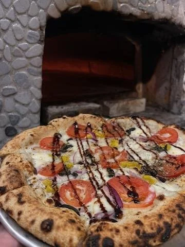 Bianca white pizza with added toppings
