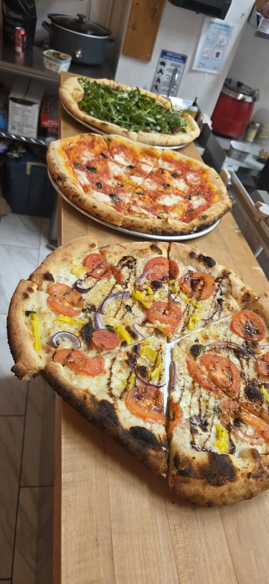 vic and nic 3 pizza counter.jpg
