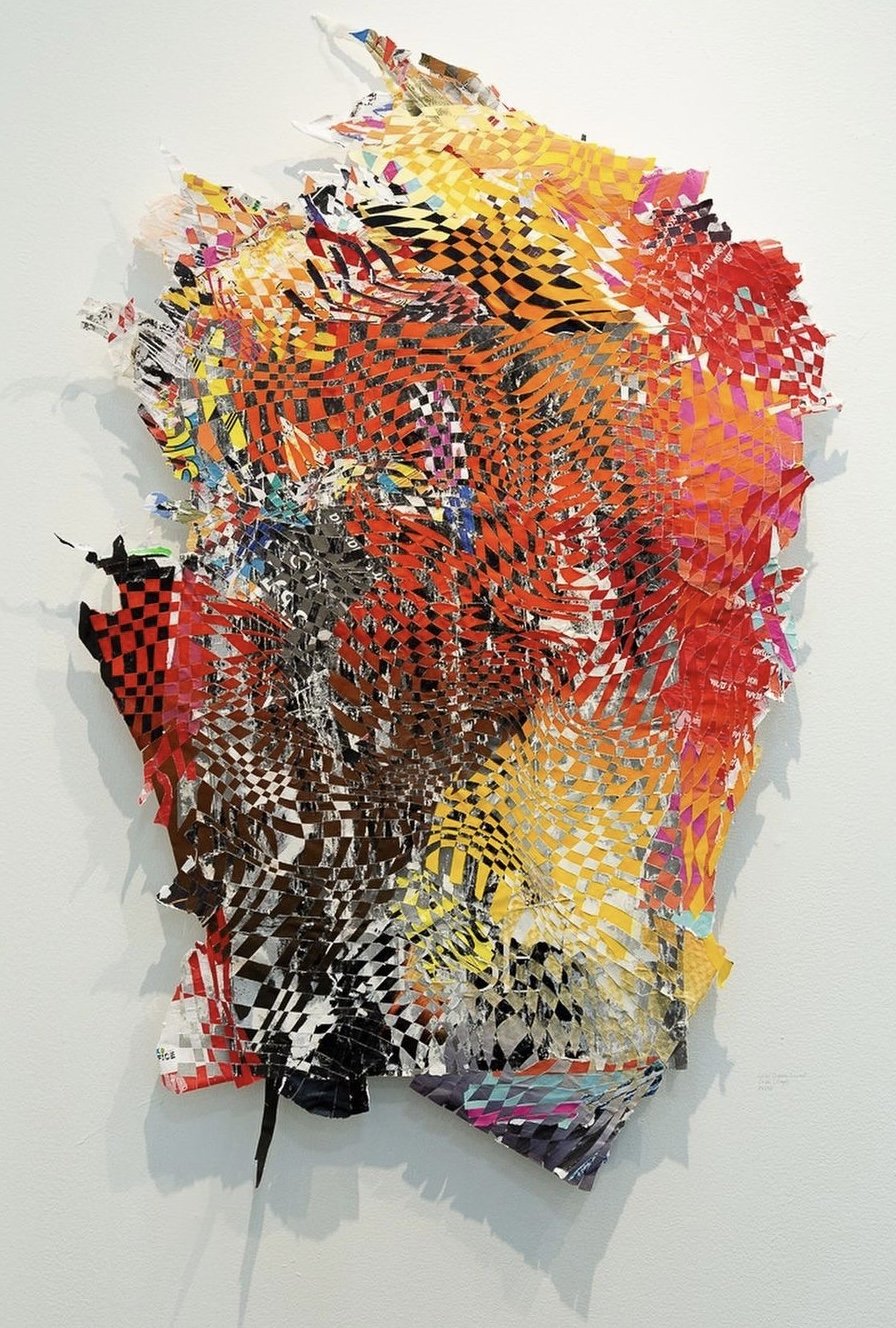 ORIBE (ROUGE), 2022, found street posters from New York City and Bulgaria; sliced and woven, 56 x 36 in