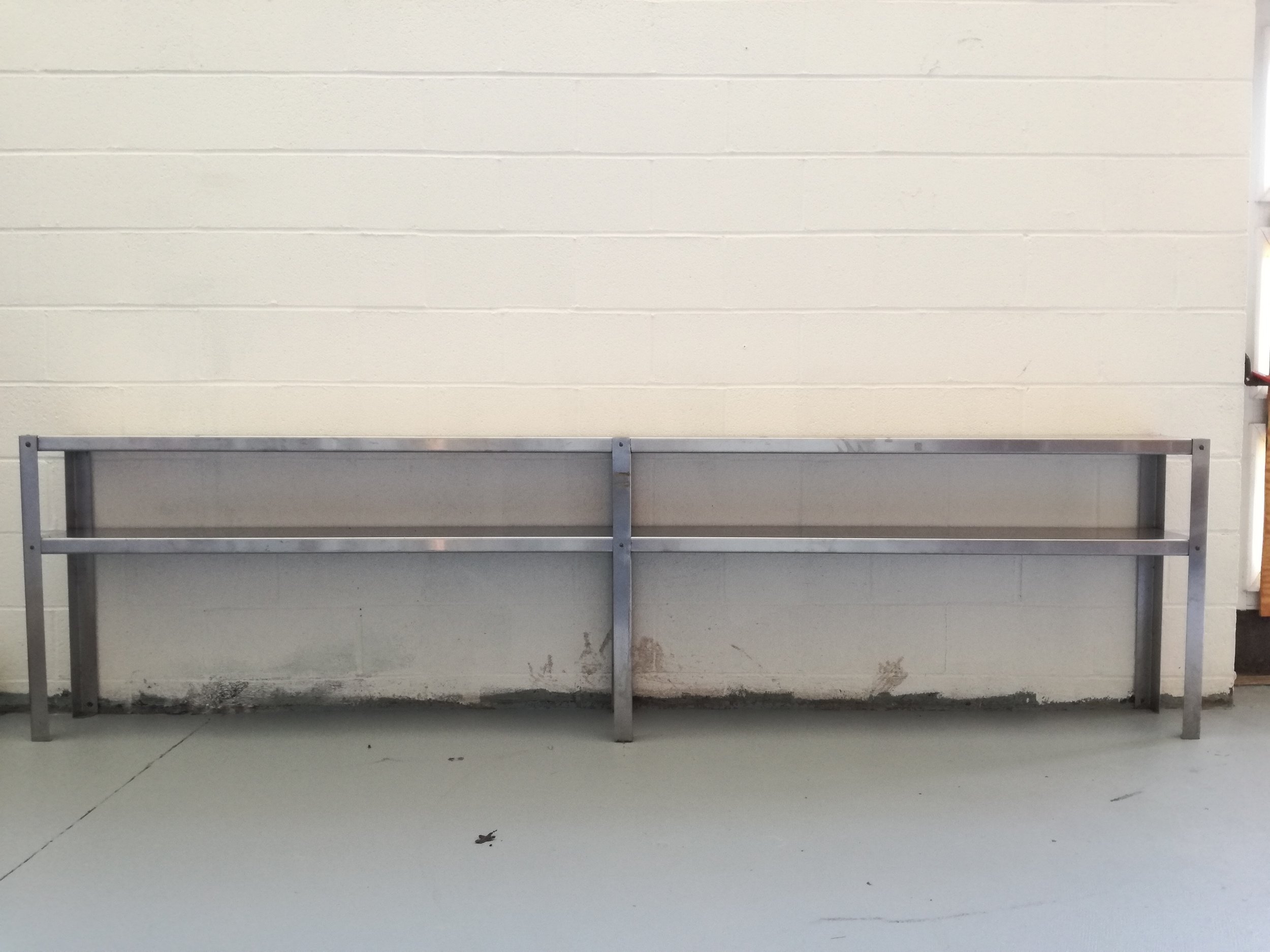 2-Tier Stainless Steel Counter Top Storage Shelf, NSF $100 Excellent shelf for your storage and working needs. Quickly add space to your kitchen or facility with this heavy duty shelf. Overall measurements: 116 Inch (9'8'') Long by 10'' wide by 30'' tall. 