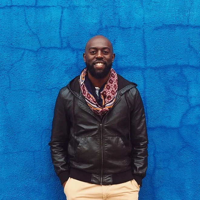 Obed Obwoge Obed Obwoge is a Kenyan born photographer based in Brooklyn, NY. While his passion for photography is rooted in the city’s rich history of street photography; he is also interested in portraiture and using the medium as a vehicle to create images that change the way people of color view themselves and the way they are portrayed in the media and arts. With no formal training in photography, Obed lets his eye guide him in composing images that invoke emotion and force the viewer to consider their relationship with the subject. His images have been featured in several print and digital publications such as Essence, Wear Your Voice Mag, and Upward Magazine as well as several exhibits locally and internationally, culminating with a feature in the 2017 Indian Photography Festival in Hyderabad.