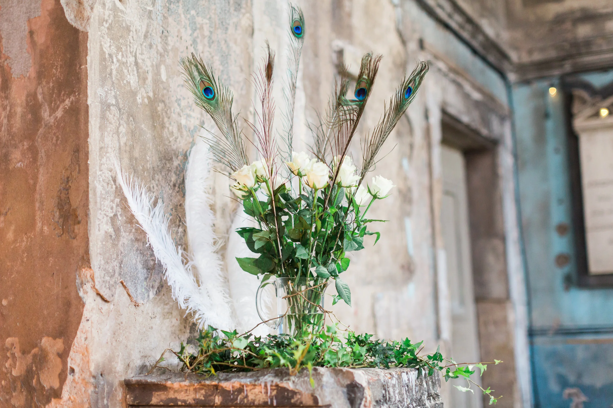beautiful peacock feathers at wedding.jpg