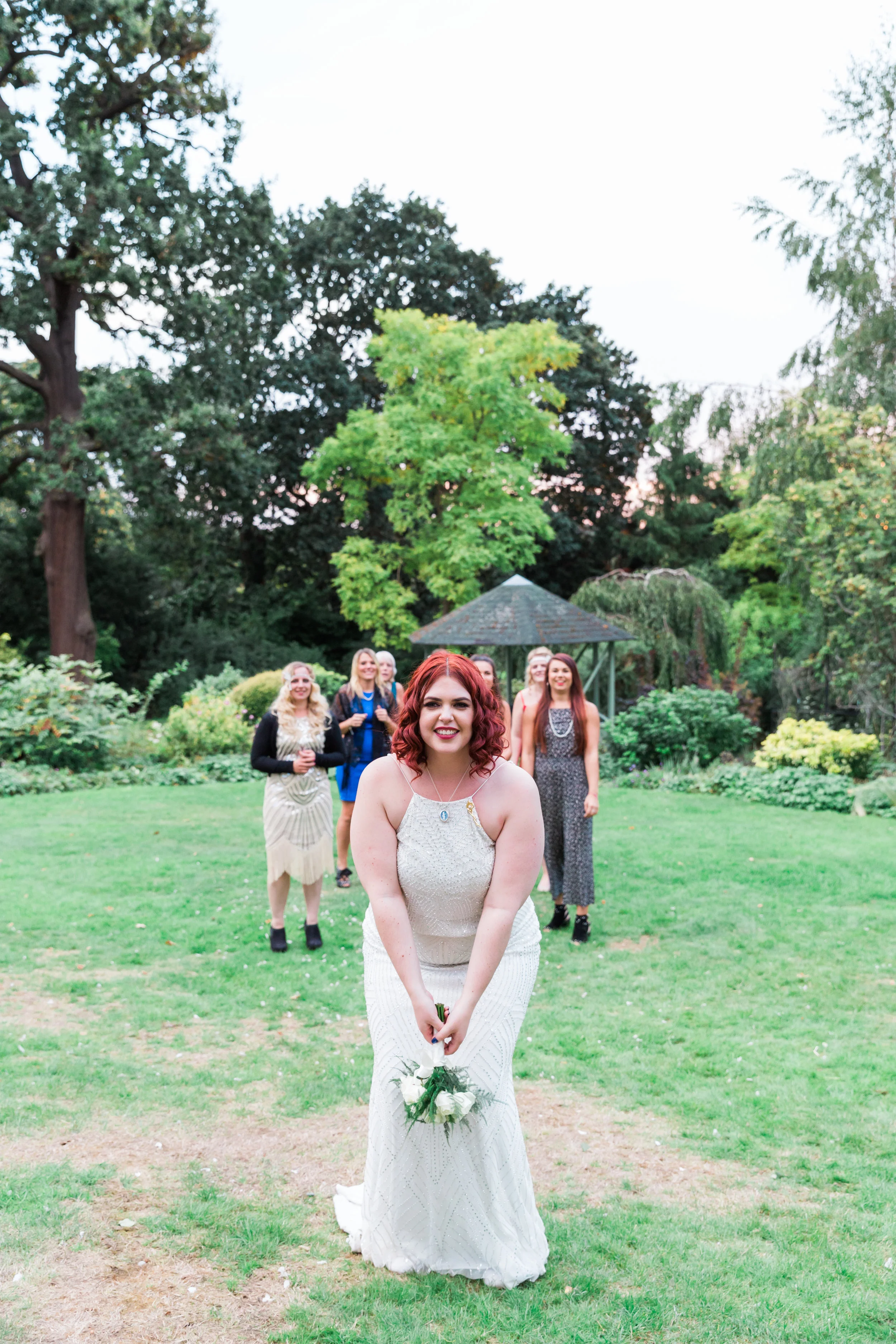 vintage bride throwing the bouquet.jpg