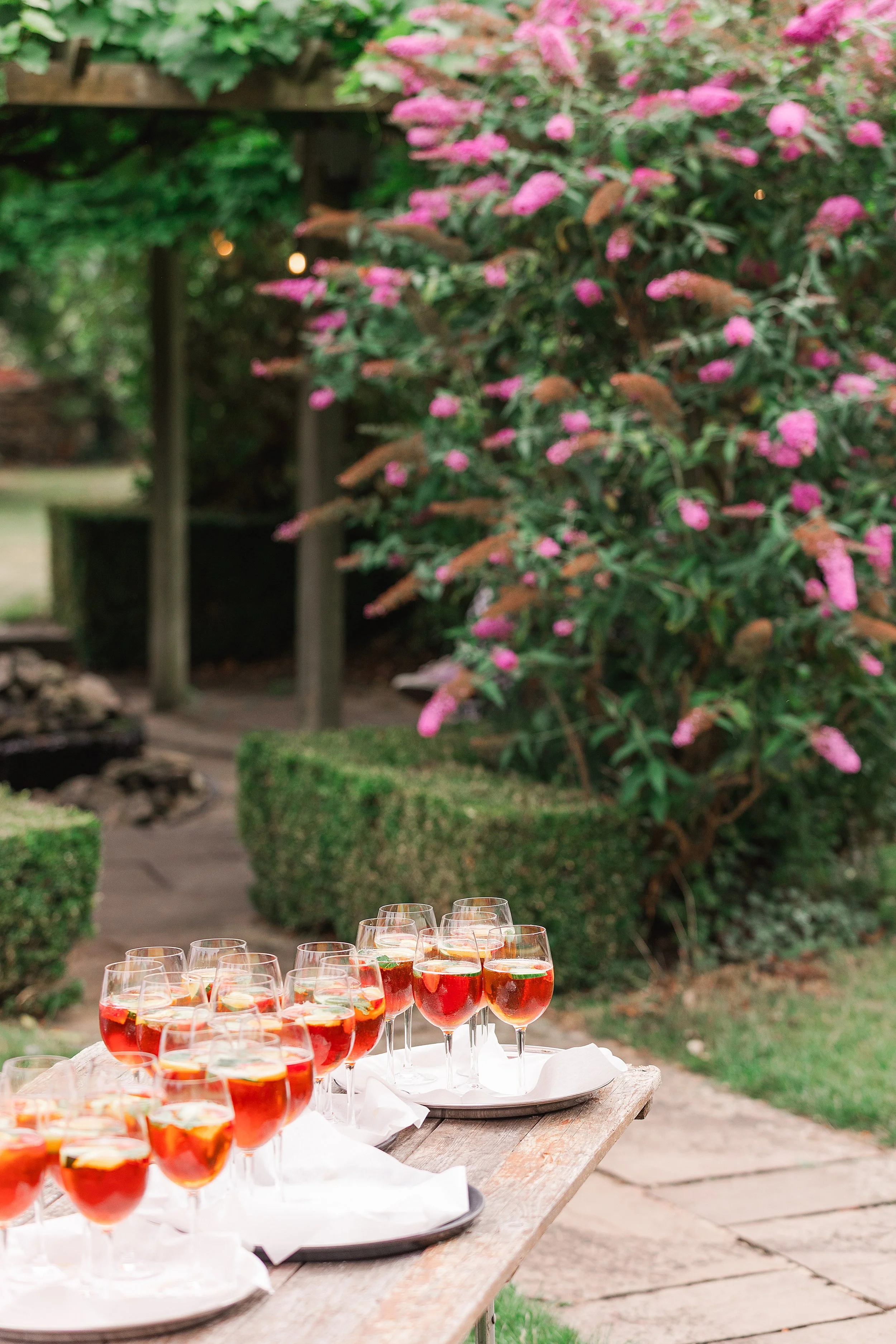 A table full of summer Pimm's in an English country garden