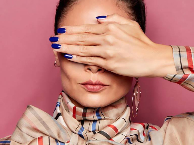 orly-blue-nail-polish-model-covering-face_2016_11-800px.jpg
