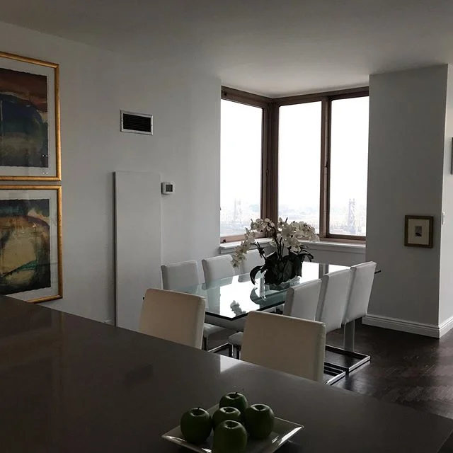 Art work dramatically hung solves the ac location problem .