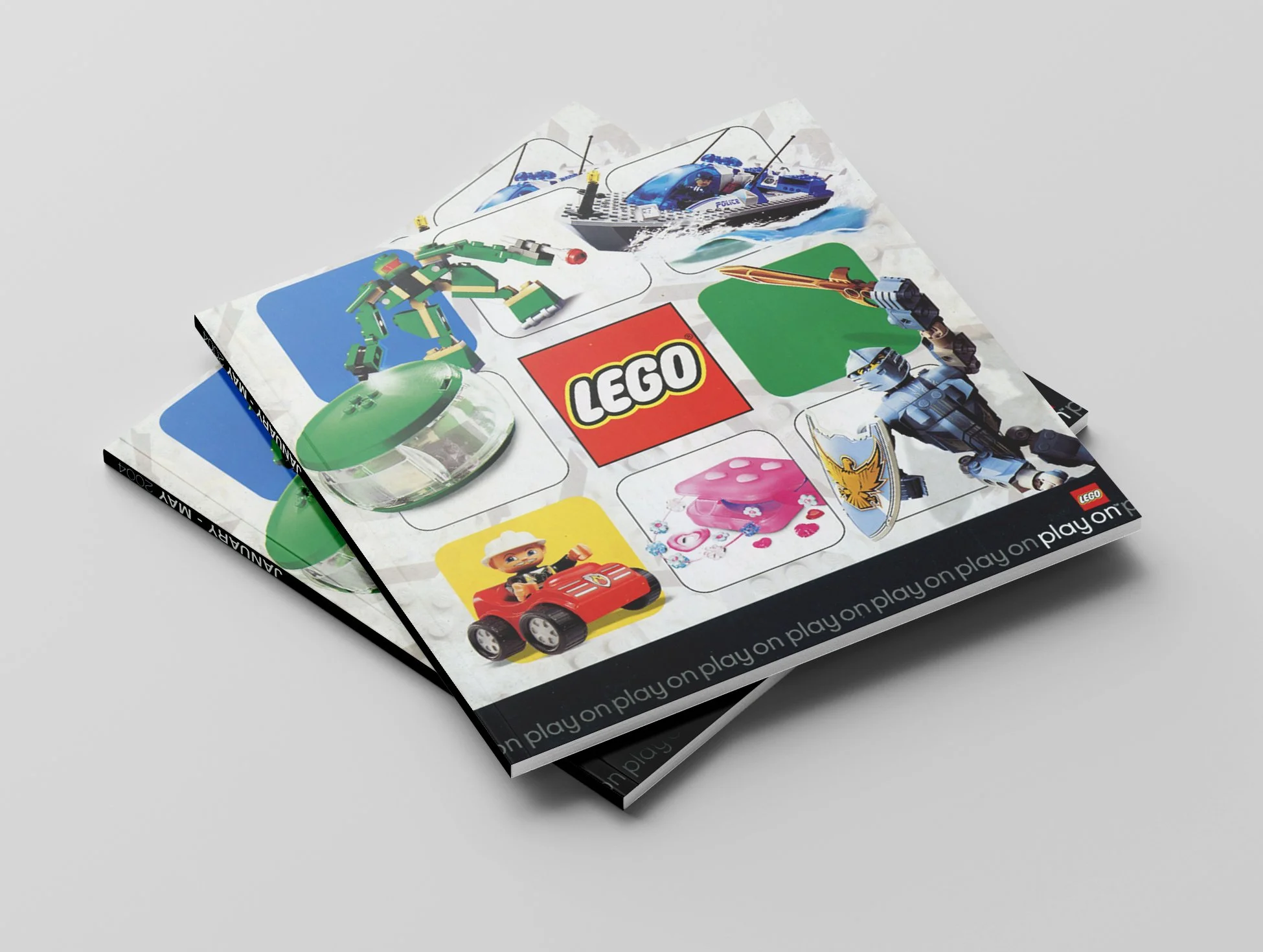 pile of lego brochures.jpg