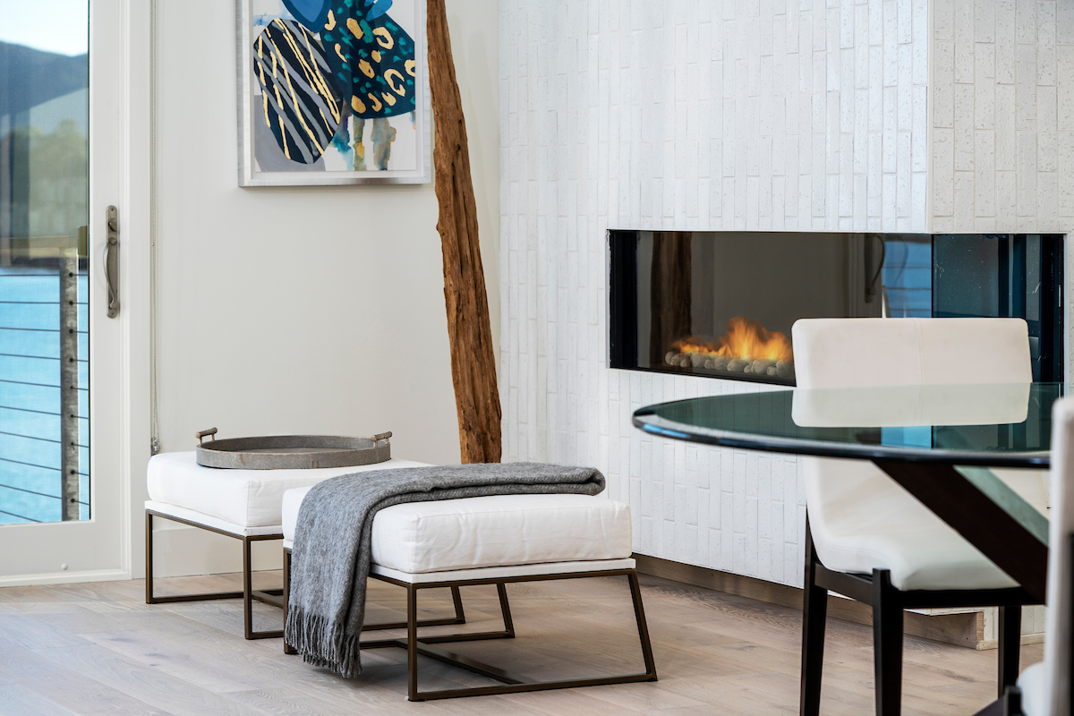 A gas burning fireplace (one of two in the residence) is located in the living room and dining area.