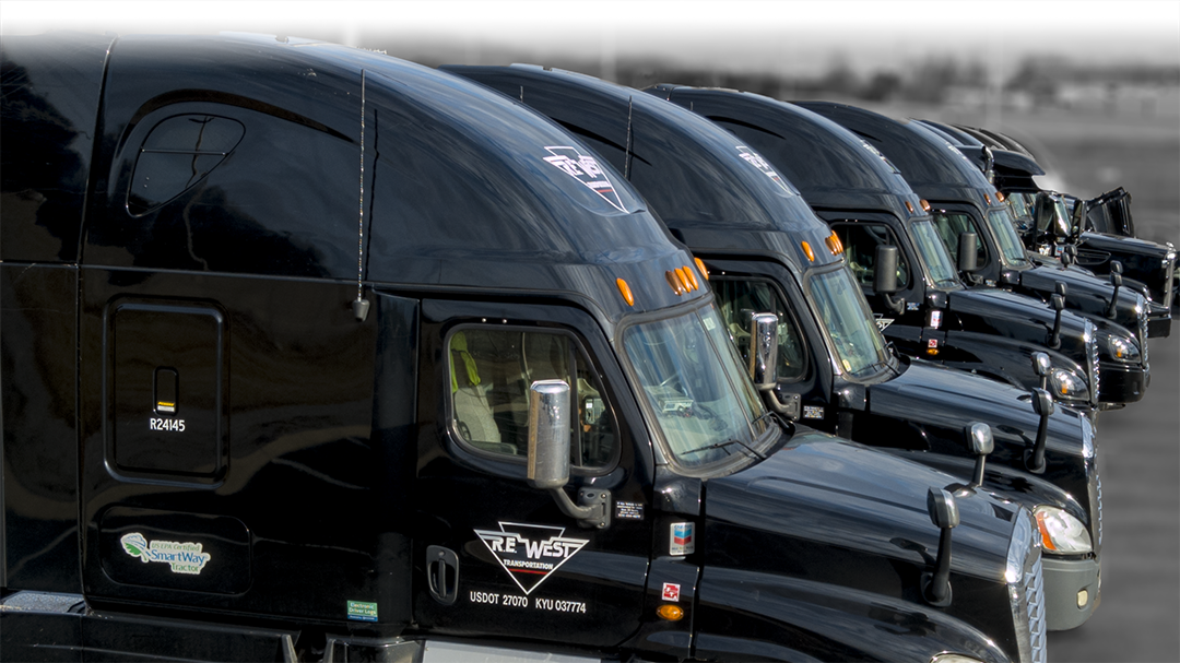 Line of Trucks Stylized BW Background.png