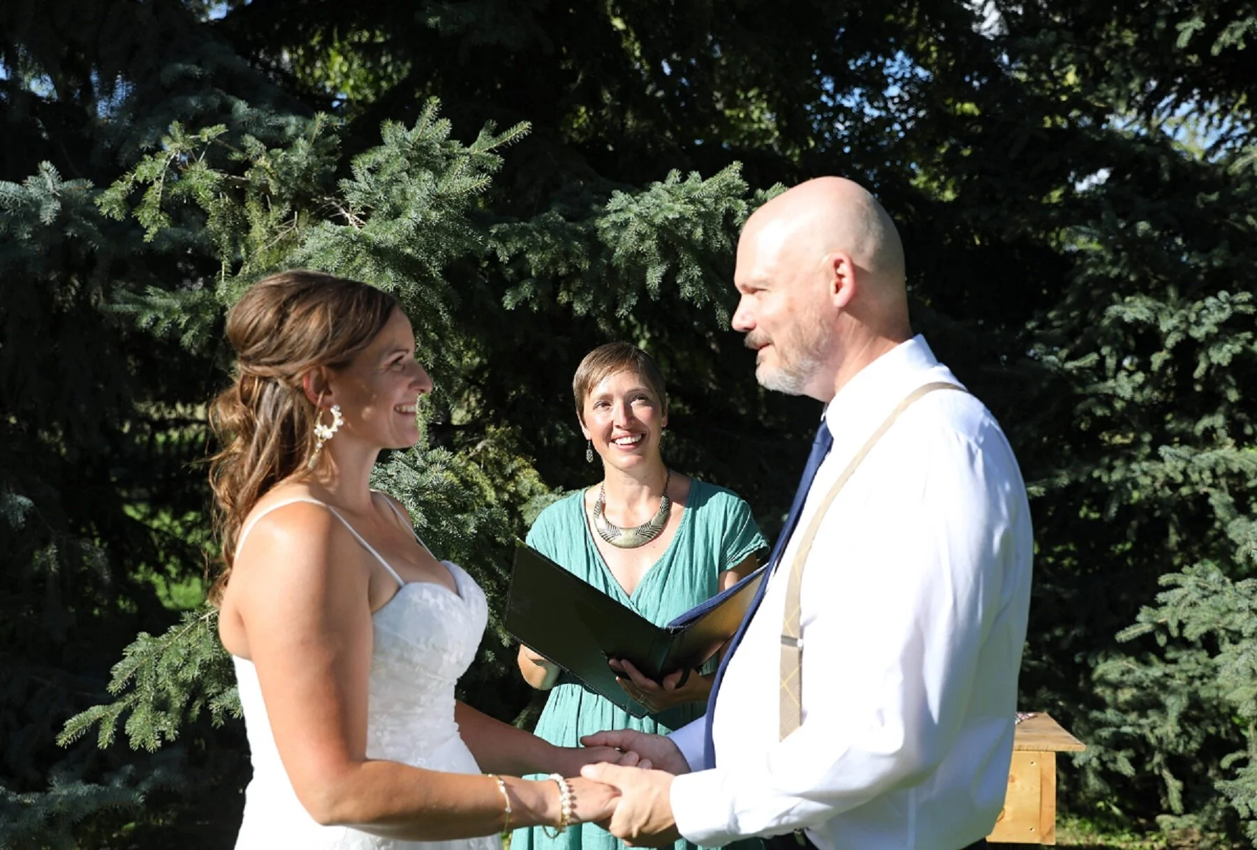Trevor and Kathryn vows with Karla in middle.jpg