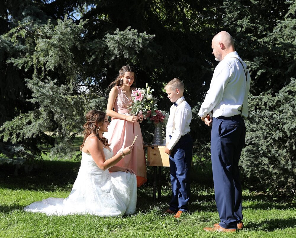 Bride stepmom vows to kids_Kinsmen Park Saskatoon_Karla Combres Celebrant.jpg