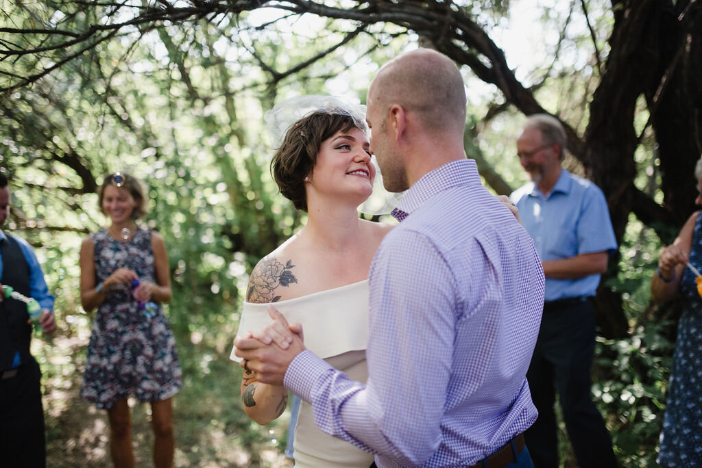 Adoring eyes during first dance and bubbles_Mandy and Rob_Aug 2020_Emma Love.jpg