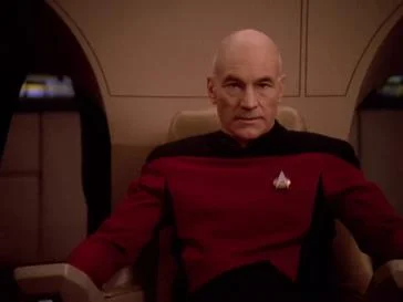 Patrick Stewart as Jean-Luc Picard in Star Trek: The Next Generation .