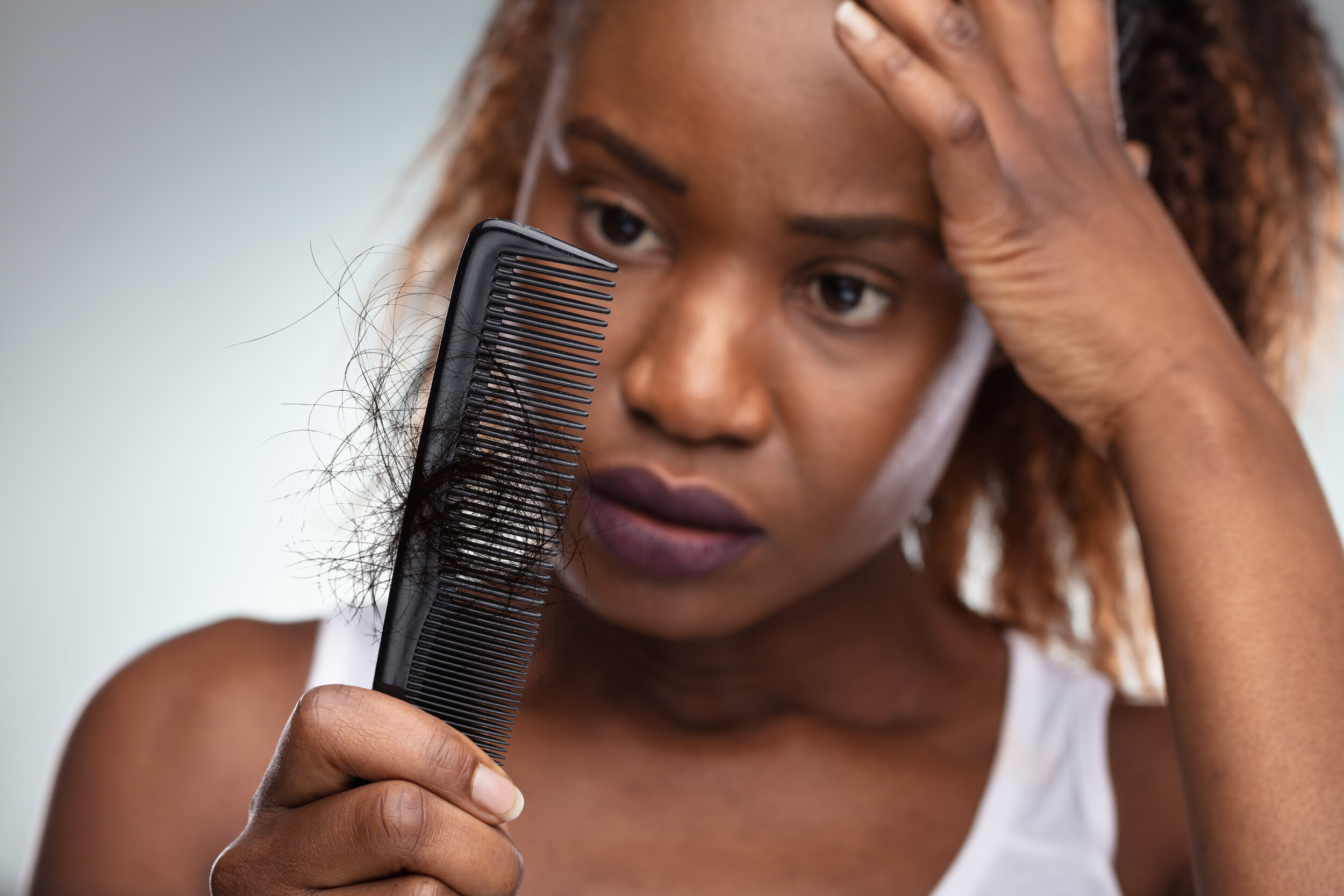 Natural Ways to Treat Postpartum Hair Loss — CODDLE
