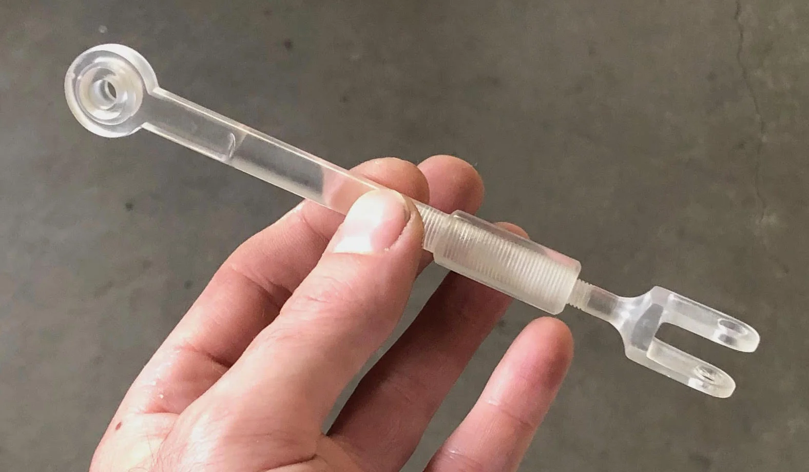 machined acrylic linkage.jpg