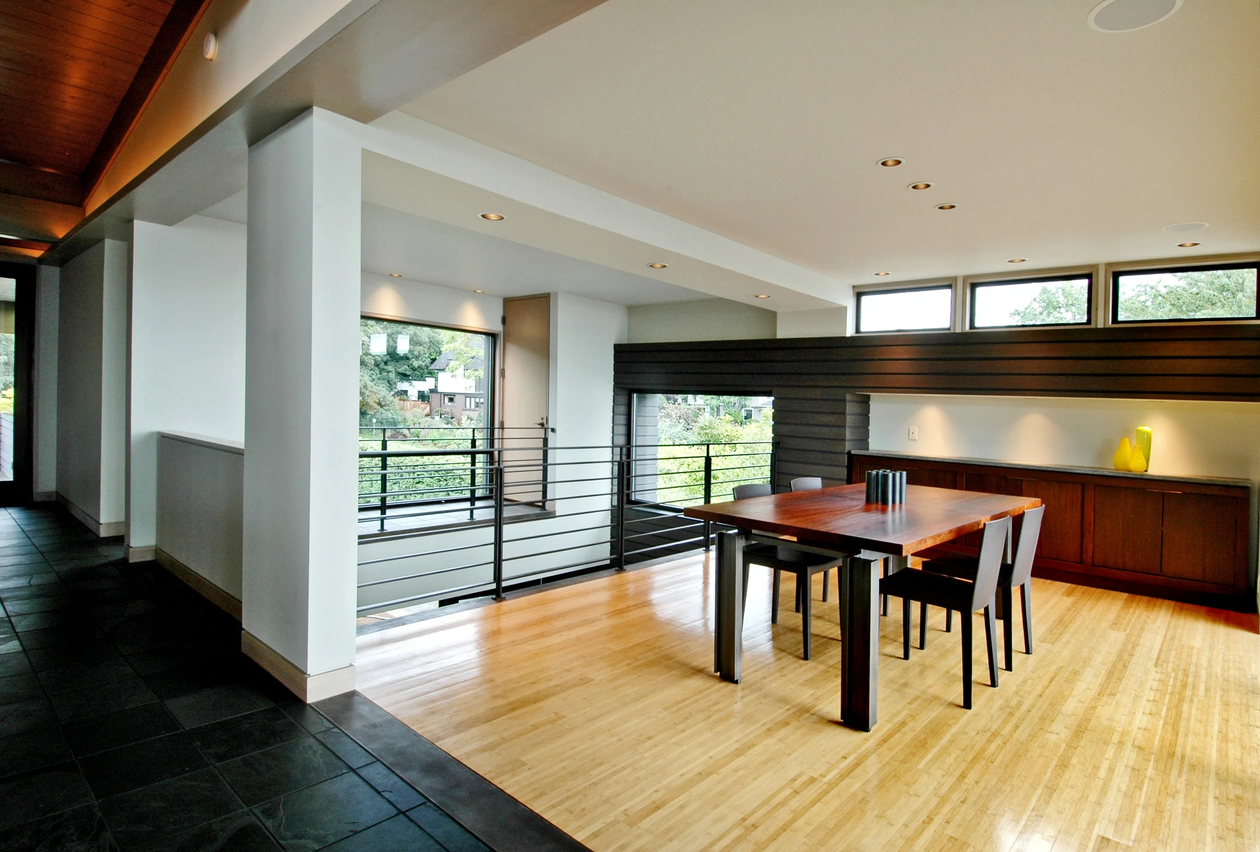 Dining table with steel base and cherry wood surface. Fabricated in 1999.