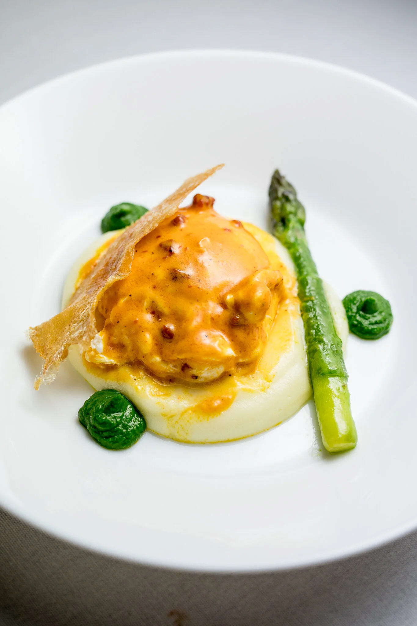 Green Asparagus, Coddled Egg, Chicharron, Stinging Nettles, Achiote Fondue