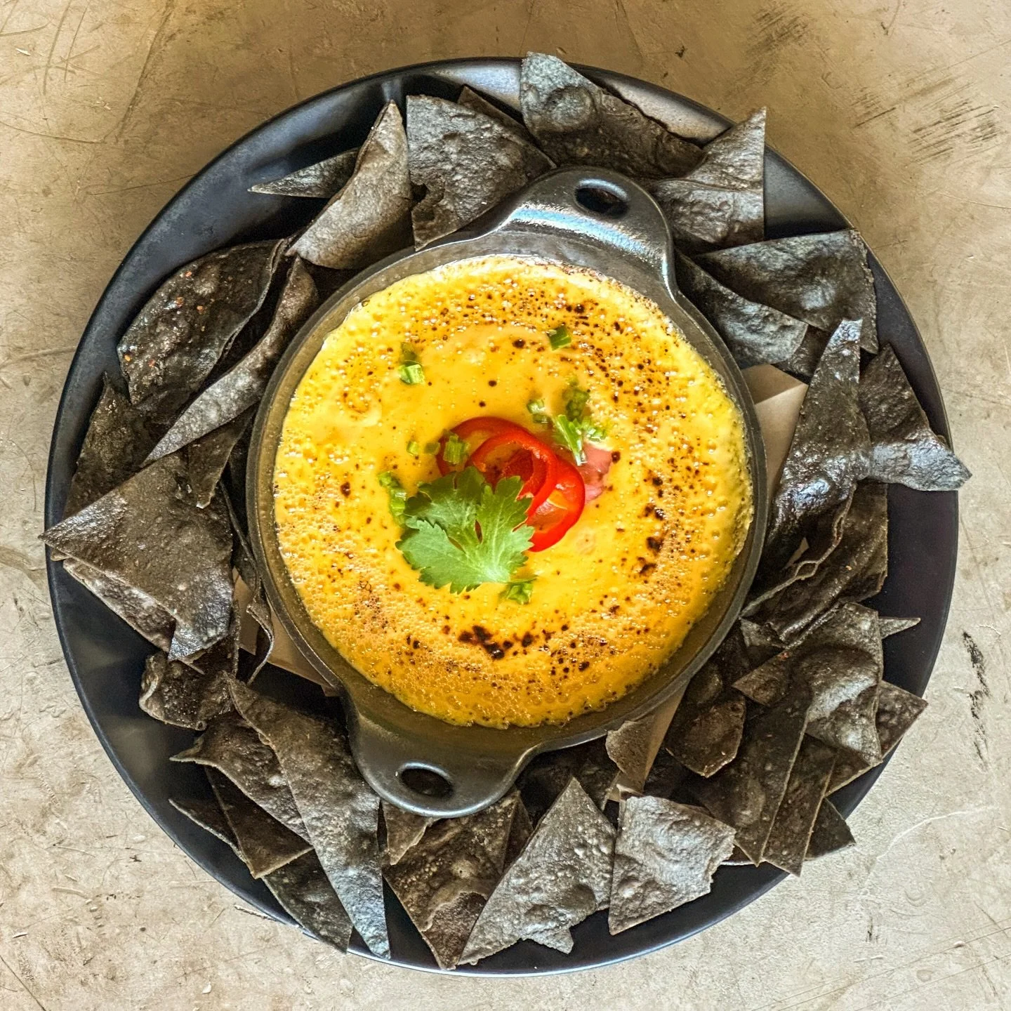 Melted Monterey cheese, pickled Fresnos, crispy blue corn tortillas. 

Pro tip  add house chorizo if you know what&rsquo;s good for you 😈

HAPPT HOUR OR LATE NIGHT!