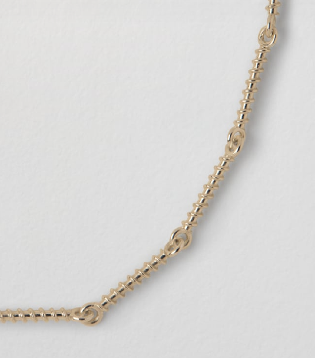 JUNETHINGS_GOLD_SCREW_NECKLACE_FRAGMENT_.png