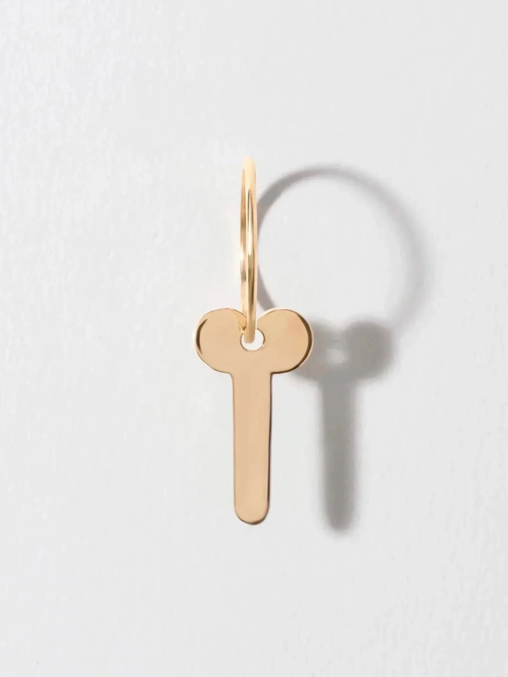 MASCULINE KEY PENDANT IN YELLOW GOLD