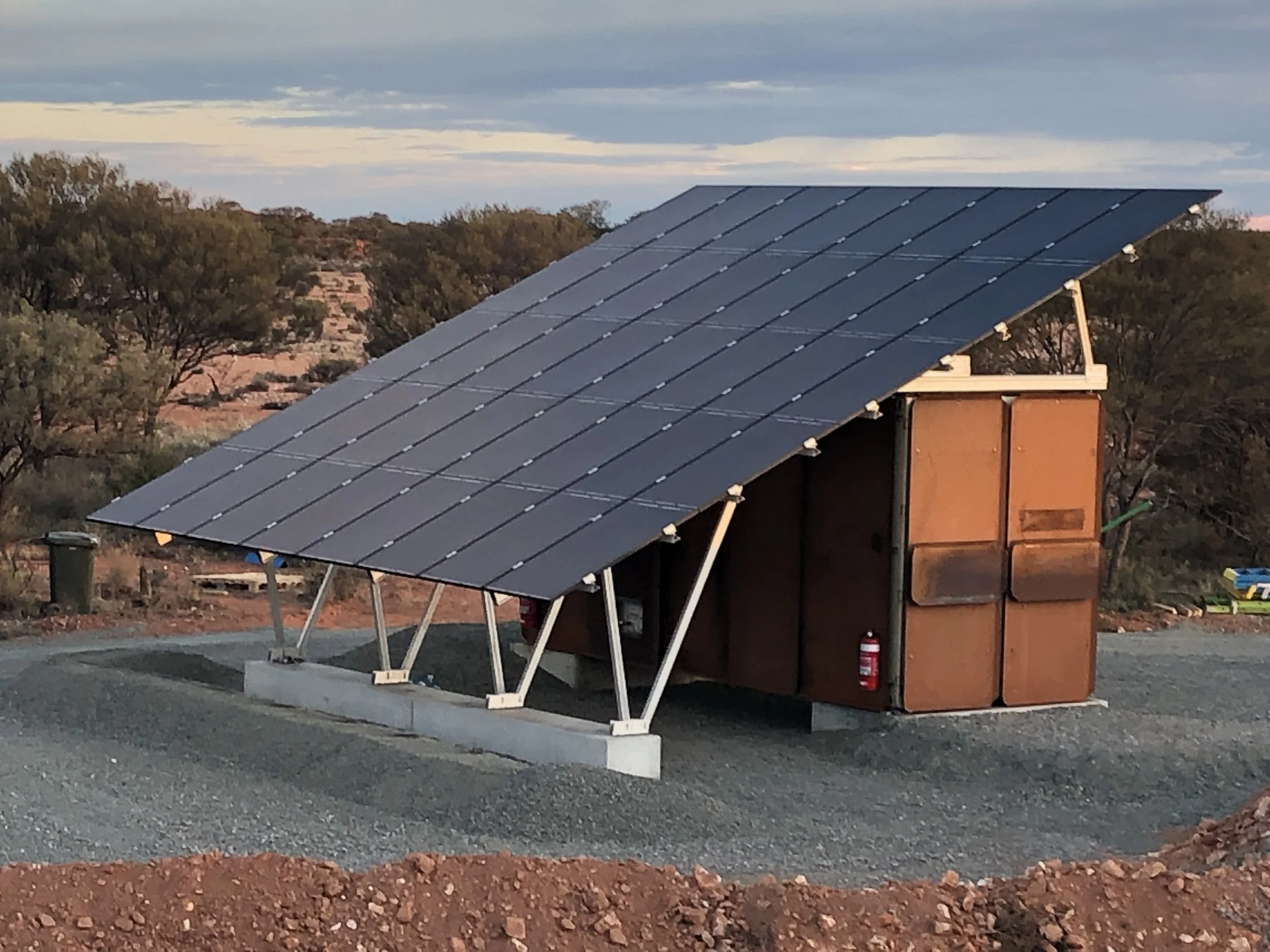 Transportable off-grid solar hybrid power station in shipping container with integrated batteries and genset, designed and built by AC Change WA