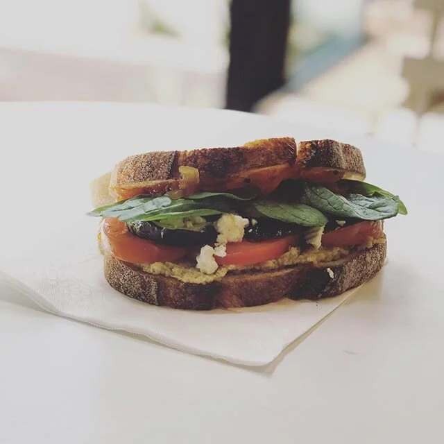 To all our veggos out there! We got a deliciously stacked vego sandwich 🤤 roasted zucchini, fresh tomatoes, feta and our tangy house artichoke dip!! Come grab one before they’re all gone #brisbanefood #brisbaneeats #shortorder #vegetarian #lunch