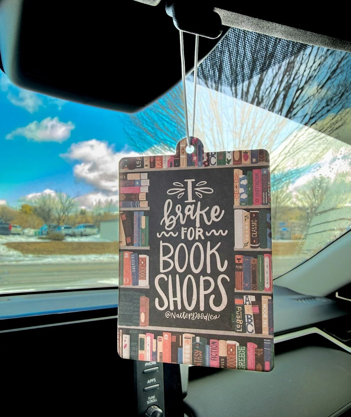 Prioritize paperbacks over potholes and show your literary loyalty to other drivers on the road by accessorizing your car with a new air freshener 🚗📖