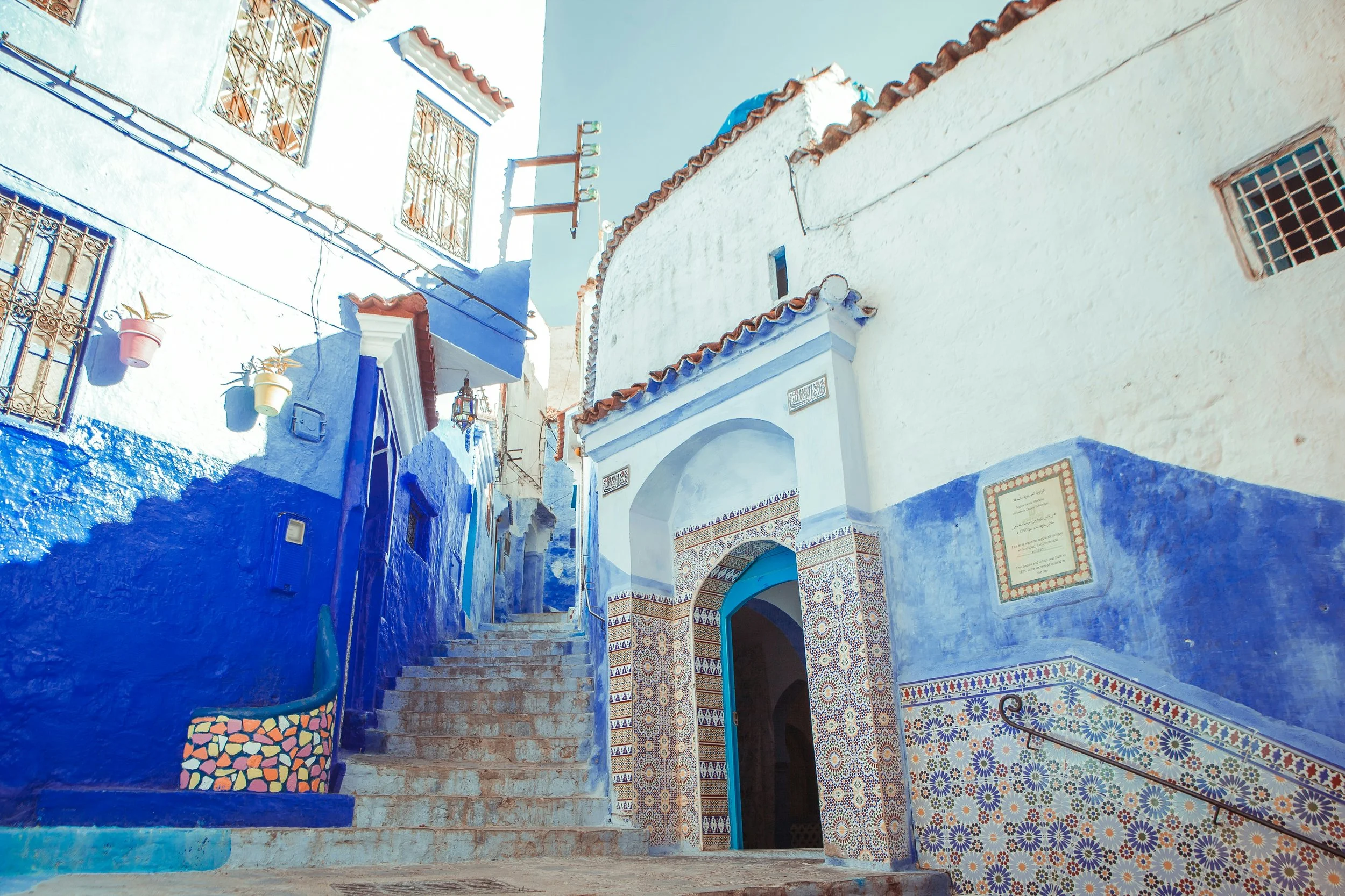 Pretty, traditional blue painted and tiled houses and steps.
