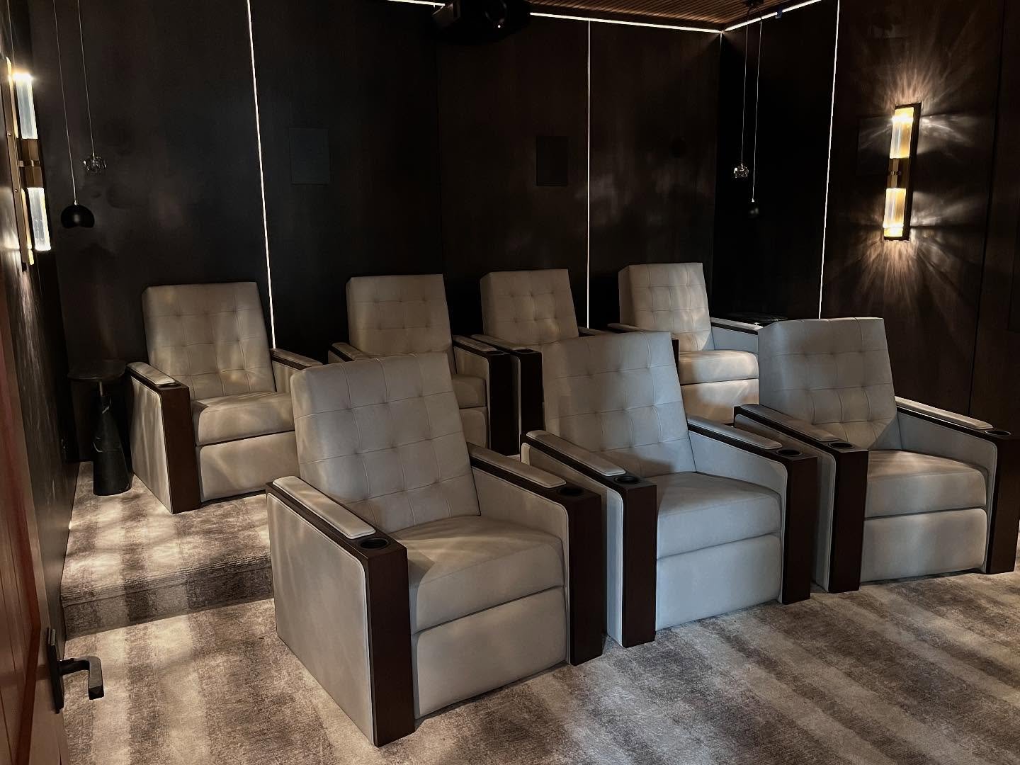 The devil is in the details, but the details are the magic.✨The details in this home theater are also what elevated the space beyond just another theater room. The custom acoustic panels made by the talented team @finelinemillworks were created with 
