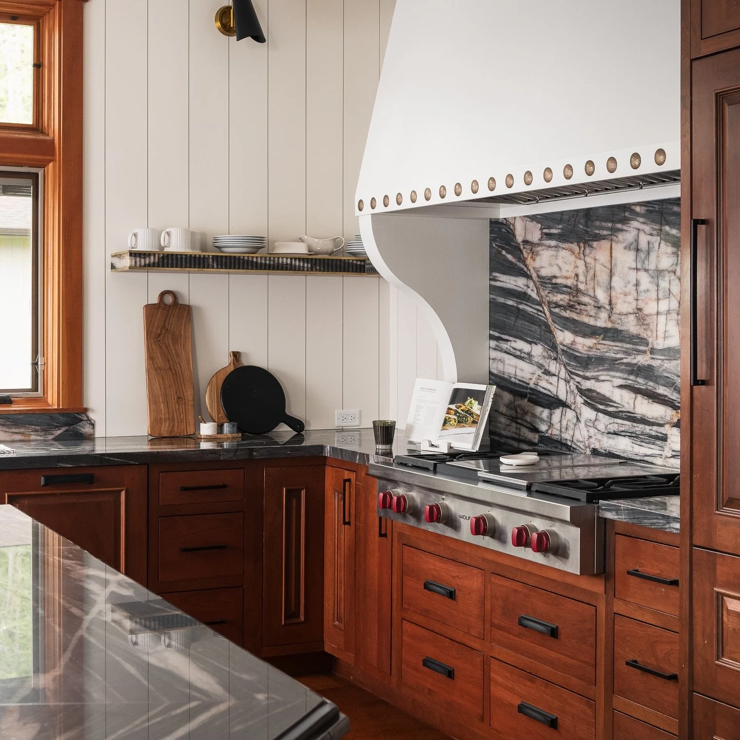 Welcome to Grandview Lake, quite possibly one of our most challenging, yet rewarding projects to date. The request: reinvent the entire home, while salvaging as many of the existing features as possible.

In the kitchen, we were asked to keep the cab