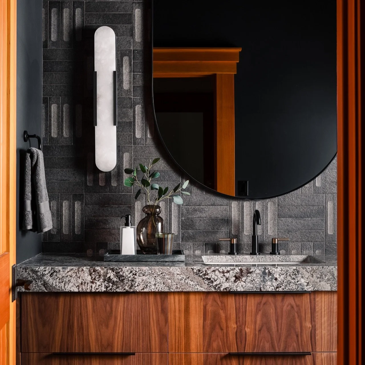 His parents asked for a teen suite. We delivered a cocoon.

Dark, moody, and masculine &mdash; a room built to grow with him. Something tells us he'll be in no hurry to leave.

Swipe for the before.

Photo: @nolancalischphoto 

#martendesign #grandvi